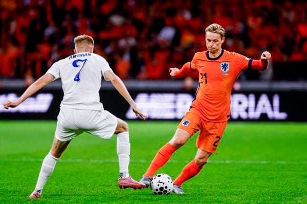 Frenkie de Jong of the Netherlands dribbles with the ball under pressure from Oliver Antman of Finland Netherlands v Finland, FIFA World Cup, WM, Weltmeisterschaft, Fussball 2026 Qualifier, Netherlands v Finland, Johan Cruijff Arena, October 12, 2025, Amsterdam, Netherlands.