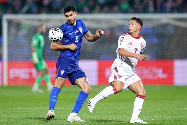 Croatia v Gibraltar - FIFA World Cup, WM, Weltmeisterschaft, Fussball 2026 Qualifier VARAZDIN, CROATIA - OCTOBER 12: Martin Erlic of Croatia nad Tjay De Barr of Gibraltar battles for the ball during the FIFA World Cup 2026 qualifier match between Croatia and Gibraltar at Football Stadium Varteks on October 12, 2025 in Varazdin, Croatia.  MatijaxHabljak PIXSELL