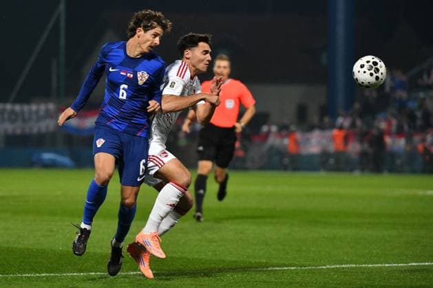 Croatia v Gibraltar - FIFA World Cup, WM, Weltmeisterschaft, Fussball 2026 Qualifier VARAZDIN, CROATIA - OCTOBER 12: Domagoj Bradaric of Croatia and James Scanlon of Gibraltar battles for the ball during the FIFA World Cup 2026 qualifier match between Croatia and Gibraltar at Football Stadium Varteks on October 12, 2025 in Varazdin, Croatia.  VjeranxZganecxRogulja PIXSELL