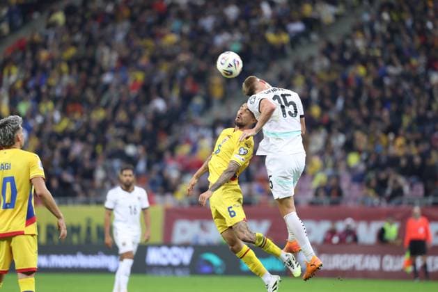 SOCCER - FIFA WC quali, ROU vs AUT BUCHAREST,ROMANIA,12.OCT.25 - SOCCER - FIFA World Cup, WM, Weltmeisterschaft, Fussball 2026, European Qualifiers, group stage, OEFB international match, Länderspiel, Nationalmannschaft Romania vs Austria. Image shows Marius Marin (ROU) and Philipp Lienhart (AUT). GEPAxpictures xArminxRauthner