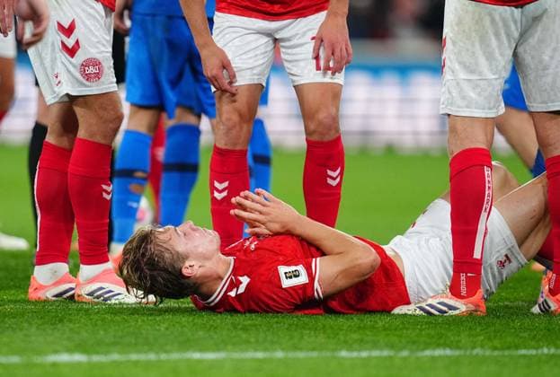 October 12 2025: Rasmus HoÂ¸jlund of Denmark on the ground during a World Cup Qualification game, Denmark v Greece, at Parken, Copenhagen, Denmark. Kim Price CSM Copenhagen Denmark - ZUMAc04_ 20251012_zma_c04_056 Copyright: xUlrikxPedersenx