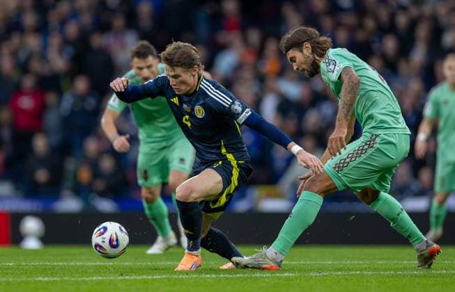 12th October 2025; Hampden Park, Glasgow, Scotland; World Cup Qualifiers International Football, Scotland versus Belarus; Evgeni Yablonski of Belarus tackles Scott McTominay of Scotland  VagelisxGeorgariou