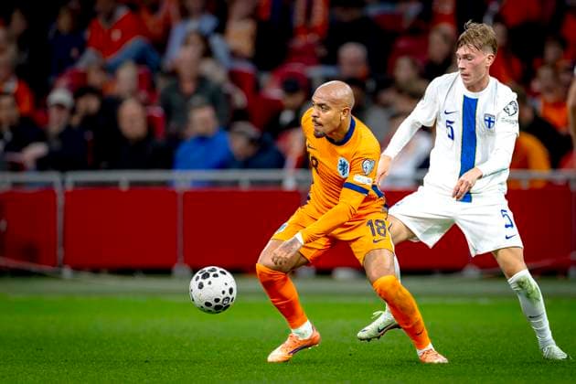 Netherlands forwarder Donyell Malen, Finland defender Juho Lahteenmaki during the match Netherlands vs Finland at the Johan Cruijff ArenA for the European Qualifiers Group G season 2025-2026 in AMSTERDAM, Netherlands on 12 oktober 2025, (photo by Marcel van Dorst EYE4images DeFodi Images) Netherlands forwarder Donyell Malen, Finland defender Juho Lahteenmaki during the match Netherlands vs Finland at the Johan Cruijff ArenA for the European Qualifiers Group G season 2025 2026 in AMSTERDAM, Netherlands on 12 oktober 2025, photo by Marcel van Dorst EYE4images DeFodi Images