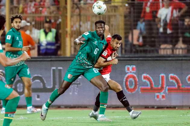 (251013) -- CAIRO, Oct. 13, 2025 -- Jorge Nogueira (2nd R) of Guinea-Bissau vies for the ball during the 2026 FIFA World Cup, WM, Weltmeisterschaft, Fussball CAF Qualifiers football match between Egypt and Guinea-Bissau in Cairo, Egypt, on Oct. 12, 2025. ) (SP)EGYPT-CAIRO-FOOTBALL-FIFA WORLD CUP-CAF QUALIFIERS-EGYPT VS GUINEA-BISSAU AhmedxGomaa 