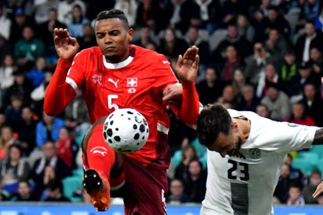 Ljubljana, Slovenia, October 13th 2025, David Brekalo of Slovenia (R) in action against Manuel Akanji of Switzerland (L) during the UEFA European Qualifiers for 2026 World Cup, Group B match between Slovenia and Switzerland at Stadium Stozice, Ljubljana, Slovenia. (Photo by Natasa Kupljenik Sports Press Photo) Copyright: xNatasaxKupljenikx xSPPx Sportspressphoto_SPR42154