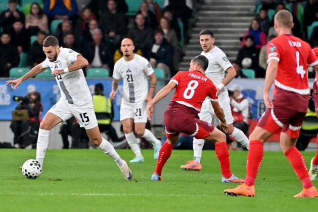 Ljubljana, Slovenia, October 13th 2025, Danijel Sturm of Slovenia (L) in action against Remo Freuler of Switzerland (C) during the UEFA European Qualifiers for 2026 World Cup, Group B match between Slovenia and Switzerland at Stadium Stozice, Ljubljana, Slovenia. (Photo by Igor Kupljenik Sports Press Photo) Copyright: xIgorxKupljenikx xSPPx Sportspressphoto_SPR42163