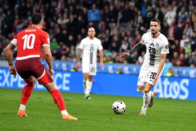 Ljubljana, Slovenia, October 13th 2025, Petar Stojanovic of Slovenia (R) in action against Granit Xhaka of Switzerland (L) during the UEFA European Qualifiers for 2026 World Cup, Group B match between Slovenia and Switzerland at Stadium Stozice, Ljubljana, Slovenia. (Photo by Natasa Kupljenik Sports Press Photo) Copyright: xNatasaxKupljenikx xSPPx Sportspressphoto_SPR42237