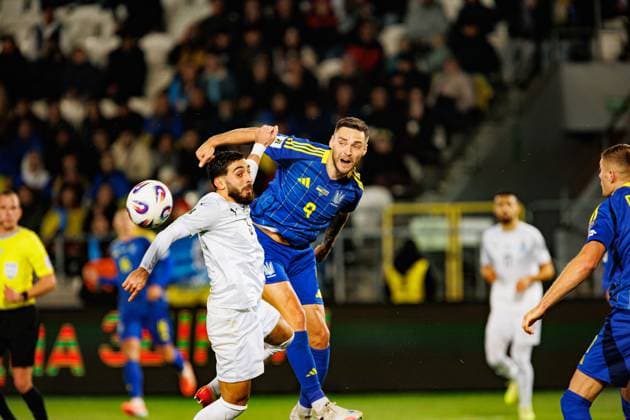 Oleksii Hutsuliak and Elvin Jafarguliyev seen during World Cup 2026 European qualification game between national teams of Ukraine and Azerbaijan (Ernest Kolodziej Ball Raw Images) Cracow Cracovia Stadium Poland Copyright: xErnestxKolodziejx ernestkolodziej_ukraine_azarbaijan_pt2_2526-142