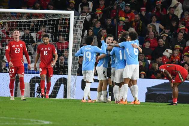 Football - 2026 FIFA World Cup, WM, Weltmeisterschaft, Fussball - European Qualifying - Group J - Matchday 8 12 - Wales vs Belgium - Cardiff City Stadium - Monday 13th October 2025 Leandro Trossard BELGIUM celebrates scoring his team s fourth goal, Wales look dejected COLORSPORT Winston Bynorth 