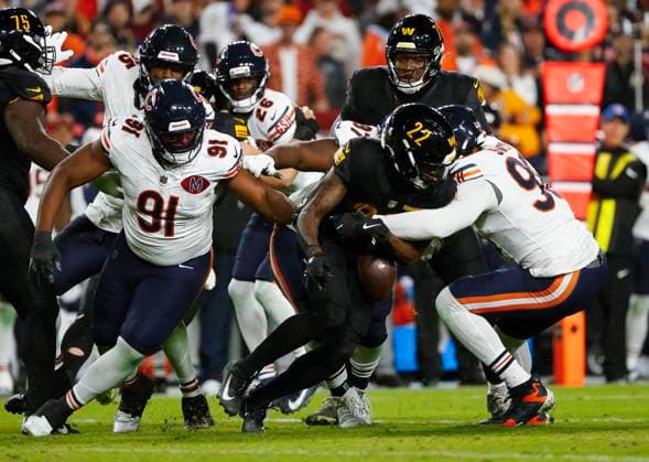 Oct 13, 2025: Washington Commanders RB 22 Jacory Croskey-Merritt fumbles the football during the Washington Commanders game against the Chicago Bears at Northwest Stadium in Landover, MD. CSM Landover United States of America - ZUMAc04_ 20251013_zma_c04_063 Copyright: xJustinxCooperx
