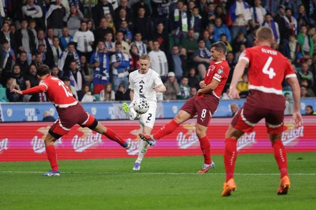 (251014) -- LJUBLJANA, Oct. 14, 2025 -- Zan Karnicnik (2nd L) of Slovenia competes during the World Cup 2026 European Qualifiers Group B football match between Slovenia and Switzerland in Ljubljana, Slovenia, Oct. 13, 2025. (Photo by Xinhua) (SP)SLOVENIA-LJUBLJANA-FOOTBALL FIFA World Cup, WM, Weltmeisterschaft, Fussball EUROPEAN QUALIFIERS-SLOVENIA VS SWITZERLAND ZeljkoxStevanic 
