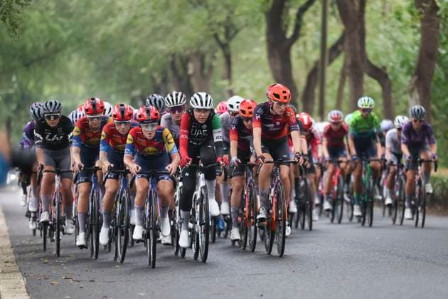 (251014) -- SHANGHAI, Oct. 14, 2025 -- Cyclists compete during Stage 1 of the UCI Women s WorldTour Tour of Chongming Island Road cycling, Rad, Radsport, Strasse race in Shanghai, east China, Oct. 14, 2025. ) (SP)CHINA-SHANGHAI-CYCLING-UCI WOMEN S WORLDTOUR-TOUR OF CHONGMING ISLAND (CN) WangxXiang 