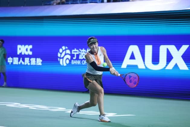 NINGBO, CHINA - OCTOBER 14: Zhu Lin of China competes in the Women s Singles Round of 32 match against Emma Raducanu of Great Britain on day 2 of 2025 Ningbo Open at the Ningbo (Yinzhou) Tennis Center on October 14, 2025 in Ningbo, Zhejiang Province of China.  Copyright: xVCGx 111597161487