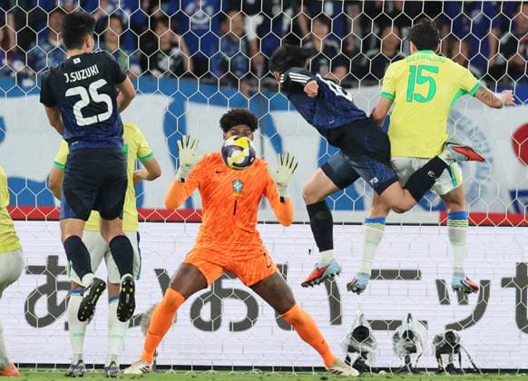 October 14, 2025, Tokyo, Japan - Japan s Ayase Ueda (2nd R) heads the ball to score a goal at the Kirin Challenge Cup football match at the Ajinomoto stadium in Tokyo on Tuesday, October 14, 2025. Brazil was defeated by Japan 2-3. (photo by Yoshio Tsunoda AFLO) Noxthirdxpartyxsales  aflo_306960738