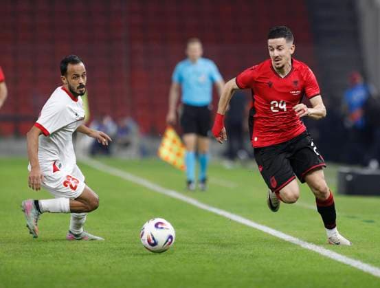 Albania vs Jordan friendly match, Tirana, Albania on October 14, 2025. Albania s Nazmi Gripshi (R) and Adham Al-Quraishi (L) fight for the ball during a friendly football match between Albania and Jordan at the Air Albania Stadium in Tirana on October 14, 2025. TIRANE ALBANIA Copyright: xMALTONxDIBRAx