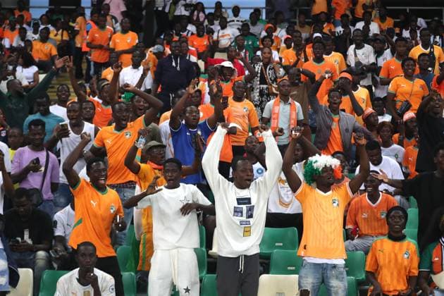 (251015) -- ABIDJAN, Oct. 15, 2025 -- Supporters of Cote d Ivoire cheer for the team before the FIFA World Cup, WM, Weltmeisterschaft, Fussball 2026 CAF Qualifiers Group F match between Cote d Ivoire and Kenya in Abidjan, Cote d Ivoire, Oct. 14, 2025. (Photo by Xinhua) (SP)COTE D IVOIRE-ABIDJAN-FOOTBALL-FIFA WORLD CUP QUALIFIERS-COTE D IVOIRE VS KENYA YvanxSonh 