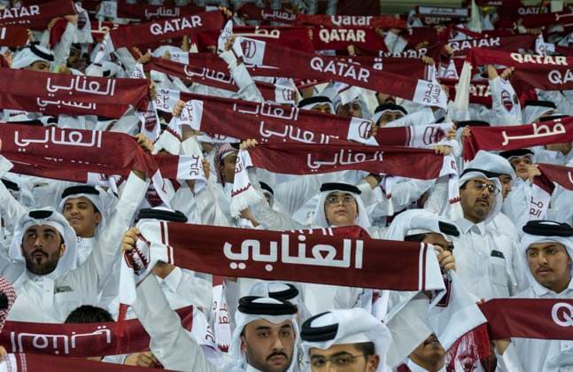 (251015) -- DOHA, Oct. 15, 2025 -- Supporters of Qatar cheer for the team before the FIFA World Cup, WM, Weltmeisterschaft, Fussball 2026 AFC Asian Qualifiers group A playoffs match between Qatar and United Arab Emirates in Doha, Qatar, Oct. 14, 2025. (Photo by Xinhua) (SP)QATAR-DOHA-FOOTBALL-PLAYOFFS ASIAN QUALIFIERS-FIFA WORLD CUP 2026-QATAR VS UNITED ARAB EMIRATES Nikku 