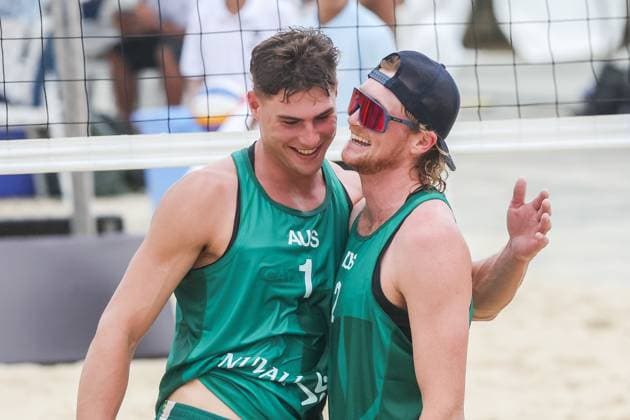 (251015) -- LAGUNA PROVINCE, Oct. 15, 2025 -- Ben Hood (L) Oliver Merritt of Australia celebrate scoring during the men s qualification match between Ben Hood Oliver Merritt of Australia and Luke de Greef Martin Licht of Canada at the Volleyball World Beach Pro Tour in Laguna Province, the Philippines, Oct. 15, 2025. ) (SP)THE PHILIPPINES-LAGUNA PROVINCE-VOLLEYBALL WORLD BEACH PRO TOUR ROUELLExUMALI 