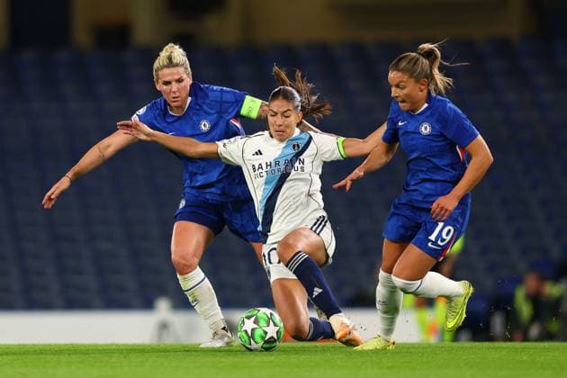London, England, 15th October 2025. Clara Mateo of Paris FC Feminines is challenged by Millie Bright (L) and Johanna Rytting Kaneryd of Chelsea during the Chelsea Women vs Paris FC UEFA Womens Champions League match at Stamford Bridge, London. Picture credit should read: Paul Terry Sportimage EDITORIAL USE ONLY. No use with unauthorised audio, video, data, fixture lists, club league logos or live services. Online in-match use limited to 120 images, no video emulation. No use in betting, games or single club league player publications. SPI_007_PT_Chelsea_W_Paris_W SPI-4216-0007