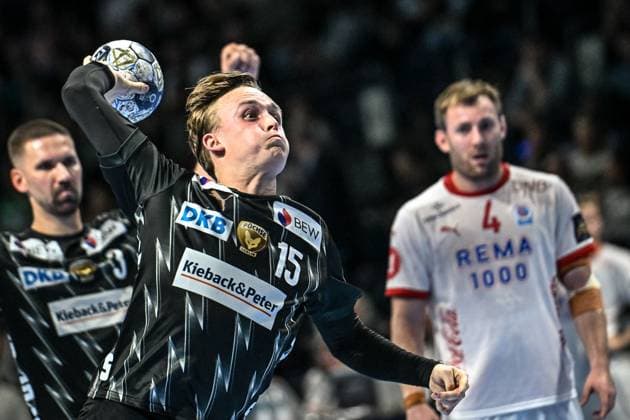 16.09.2025, xlakx, Handball, EHF Champions League, Fuechse Berlin - Kolstad Handball v.l. Tobias Grondahl (Fuechse Berlin) wirft Tor, Torschuetze, erzielt Tor, Treffer, scores the goal Berlin