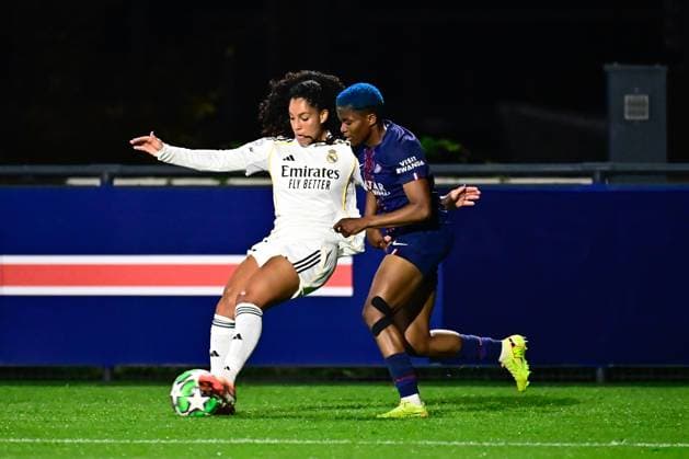 FOOTBALL : PSG vs Real Madrid - Ligue des Champions Feminine - 15 10 2025 Yasmim ( 12 - Real Madrid ) and Rasheedat Ajibade ( 10 - PSG ) during the UEFA Women s Champions League match between Paris Saint Germain and Real Madrid CF at Campus de Poissy on october 15, 2025 in Possy, France. ( Photo by Federico Pestellini PsnewZ ) - PossyFrance  Copyright: xFedericoxPestellinix