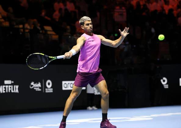 (251017) -- RIYADH, Oct. 17, 2025 -- Carlos Alcaraz of Spain hits a return during the semifinal match against Taylor Fritz of the United States at the Six Kings Slam tennis tournament in Riyadh, Saudi Arabia, Oct. 16, 2025. ) (SP)SAUDI ARABIA-RIYADH-TENNIS-6 KINGS SLAM-SEMIFINAL LuoxChen 