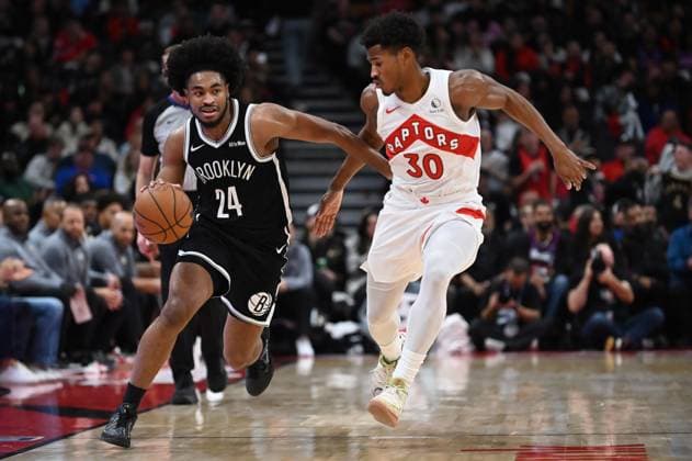 October 17, 2025, Toronto, On, Canada: Brooklyn Nets Cam Thomas (24) drives past Toronto Raptors Ochai Agbaji (30) during second half NBA, Basketball Herren, USA basketball action in Toronto on Friday Oct. 17, 2025 Cam Thomas, Ochai Agbaji  - ZUMAc35_ 20251017_zaf_c35_157 Copyright: xJonxBlackerx