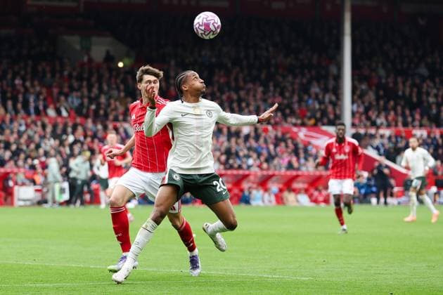 Nottingham, England, 18th October 2025. Joao Pedro of Chelsea controls the ball whilst under pressure from Nicolo Savona of Nottingham Forest during the Nottingham Forest vs Chelsea Premier League match at the City Ground, Nottingham. Picture credit should read: Jessica Hornby Sportimage EDITORIAL USE ONLY. No use with unauthorised audio, video, data, fixture lists, club league logos or live services. Online in-match use limited to 120 images, no video emulation. No use in betting, games or single club league player publications. SPI_078_JH_Forest_Chelsea SPI-4217-0078
