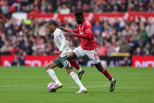 NOTTINGHAM, ENGLAND - OCTOBER 18: Joao Pedro of Chelsea and Ibrahim Sangare of Nottingham Forest battle for the ball during the Premier League match between Nottingham Forest and Chelsea at City Ground on October 18, 2025 in Nottingham, England. (Photo by James Holyoak) SPO 