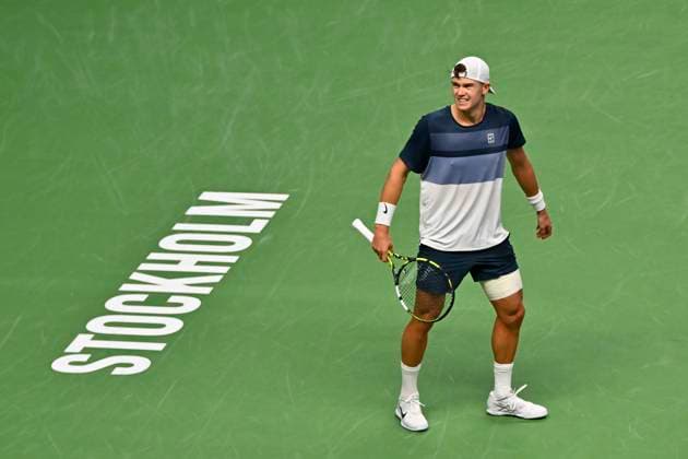 Denmark s Holger Rune injures his foot during the semifinal match against France s Ugo Humbert and leaves on a walkover during the BNP Paribas Nordic Open tennis tournament at the Royal Swedish Tennis Hall in Stockholm, Sweden, Saturday, Oct. 18, 2025. STOCKHOLM SWEDEN x10040x