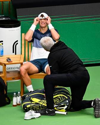 Denmark s Holger Rune injures his foot during the semifinal match against France s Ugo Humbert and leaves on a walkover during the BNP Paribas Nordic Open tennis tournament at the Royal Swedish Tennis Hall in Stockholm, Sweden, Saturday, Oct. 18, 2025. STOCKHOLM SWEDEN x10040x