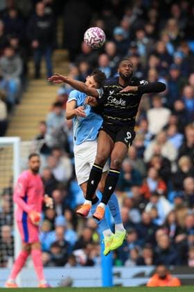 18th October 2025; Etihad Stadium, Manchester, Lancashire, England; Premier League Football, Manchester City versus Everton; Ruben Dias of Manchester City and Beto of Everton compete for a header  DxB
