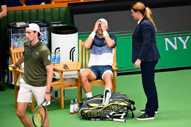 Denmark s Holger Rune injures his foot during the semifinal match against France s Ugo Humbert and leaves on a walkover during the BNP Paribas Nordic Open tennis tournament at the Royal Swedish Tennis Hall in Stockholm, Sweden, Saturday, Oct. 18, 2025. STOCKHOLM SWEDEN x10040x