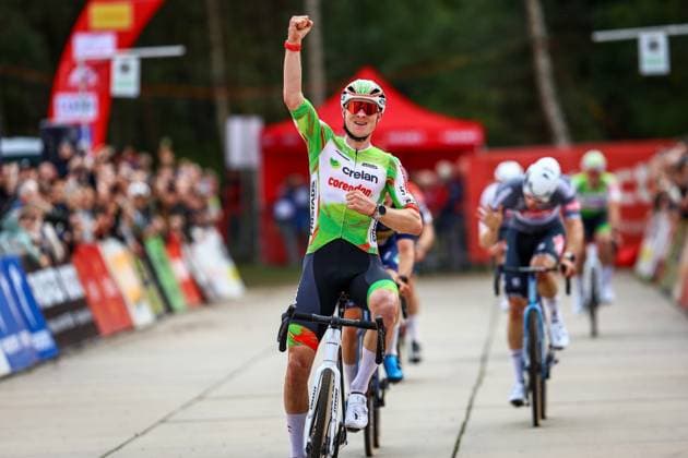 Belgian Toon Vandebosch celebrates as he crosses the finish line to win the men s elite race of the Exact Cross Essen, stage 2 (out of 7) in the Exact Cross cyclocross competition, Saturday 18 October 2025, in Essen. DAVIDxPINTENS  x137166989x