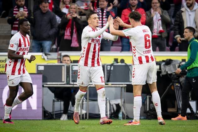 1. FC Koeln vs. FC Augsburg, 18.10.2025 KOELN, GERMANY - OCTOBER 18: Said el Mala (1. FC Koeln, 13) is celebrating Eric Martel (1. FC Koeln, 6) after his 1:1 goal during the Bundesliga match between 1. FC Koeln vs. FC Augsburg at the Rheinenergie-Stadion on matchday 7 of the 1. Bundesliga on October 18, 2025 in Koeln, Germany. DFL REGULATIONS PROHIBIT ANY USE OF PHOTOGRAPHS AS IMAGE SEQUENCES AND OR QUASI-VIDEO. Copyright: xBEAUTIFULxSPORTS AxelxKohringx