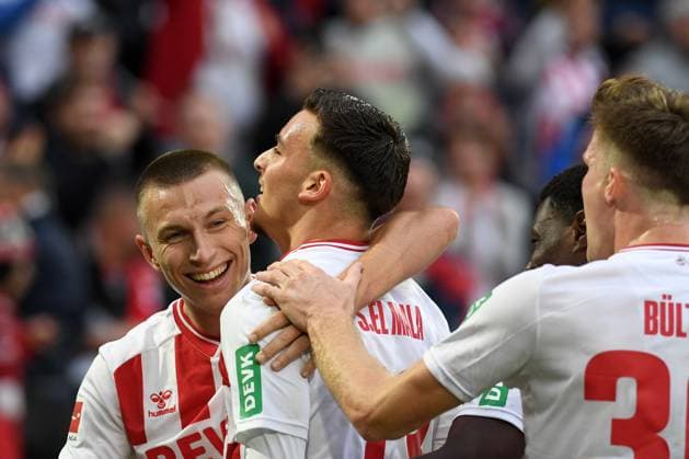 Said El Mala (1. FC Koeln) Torjubel, jubelt mit seiner Mannschaft nach dem Treffer zum 1:1 waehrend des Spiels der Bundesliga zwischen 1. FC Köln und FC Augsburg, RheinEnergieSTADION am 18. October 2025 in Köln, Deutschland. (Foto von Ralf Treese DeFodi Images) +++ Said El Mala (1. FC Koeln) celebrates after scoring his team?s first goal with teammates during the Bundesliga match between 1. FC Köln and FC Augsburg at RheinEnergieSTADION on October 18, 2025 in Köln, Germany. (Photo by Ralf Treese DeFodi Images) DFL regulations prohibit any use of photographs as image sequences and or quasi-video. (Photo by Ralf Treese DeFodi Images) Said El Mala 1 FC Koeln Torjubel, cheers with his team after scoring the 1 1 during the Bundesliga match between 1 FC Köln and FC Augsburg, RheinEnergieSTADION on October 18, 2025 in Köln, Germany Photo by Ralf Treese DeFodi Images Said El Mala 1 FC Koeln celebrates after scoring his team?s first goal with teammates during the Bundesliga match between 1 FC Köln and FC Augsburg at RheinEnergieSTADION on October 18, 2025 in Köln, Germany Photo by Ralf Treese DeFodi Images DFL regulations prohibit any use of photographs as image sequences and or quasi video Photo by Ralf Treese DeFodi Images