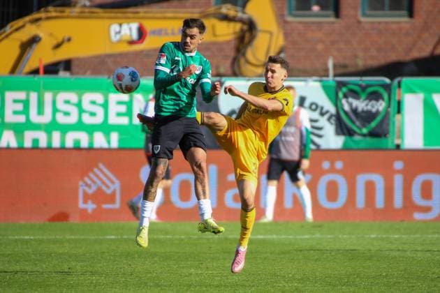 18.10.2025, xgrfx, Fussball 2.Bundesliga, Preußen Münster - Dynamo Dresden v.l. Batuhan Sertdemir (Preußen Münster), Konrad Faber (Dynamo Dresden) (DFL DFB REGULATIONS PROHIBIT ANY USE OF PHOTOGRAPHS as IMAGE SEQUENCES and or QUASI-VIDEO) Münster