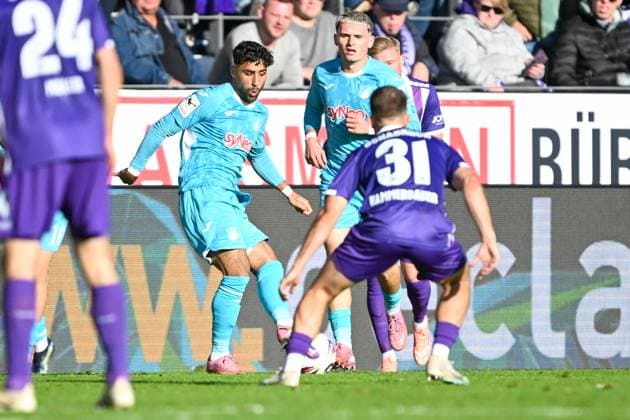 3. Liga - 25 26 - VfL Osnabrück - TSG Hoffenheim II am 18.10.2025 an der Bremer Brücke in Osnabrück Patrick Kammerbauer (Osnabrueck) im Zweikampf gegen Nader El-Jindaoui (Hoffenheim)