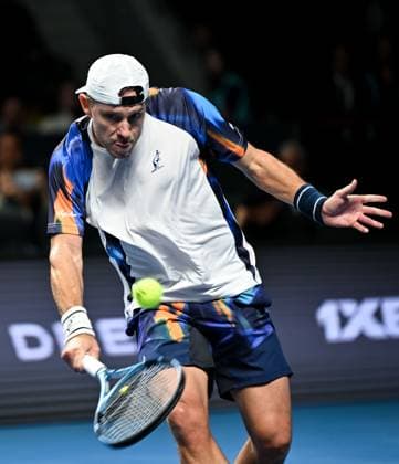 (251019) -- ALMATY, Oct. 19, 2025 -- James Duckworth of Australia hits a return during the men s singles semifinal match against Daniil Medvedev of Russia at the ATP250 Almaty Tennis Open in Almaty, Kazakhstan, on Oct. 18, 2025. ) (SP)KAZAKHSTAN-ALMATY-TENNIS-ALMATY OPEN-SEMIFINAL LixRenzi 