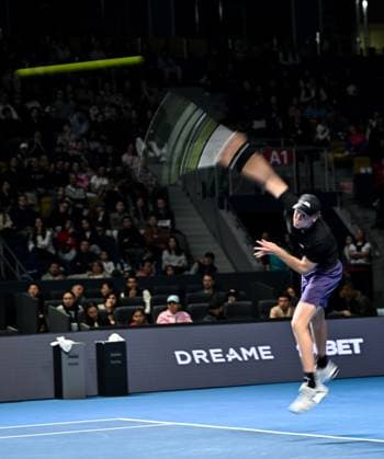 (251019) -- ALMATY, Oct. 19, 2025 -- Alex Michelsen of the United States serves during the men s singles semifinal match against Corentin Moutet of France at the ATP, Tennis Herren 250 Almaty Tennis Open in Almaty, Kazakhstan, on Oct. 18, 2025. ) (SP)KAZAKHSTAN-ALMATY-TENNIS-ALMATY OPEN-SEMIFINAL LixRenzi 