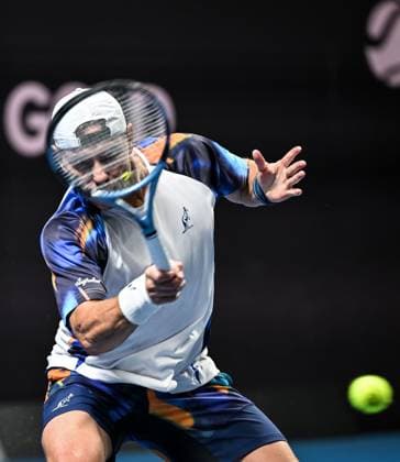 (251019) -- ALMATY, Oct. 19, 2025 -- James Duckworth of Australia hits a return during the men s singles semifinal match against Daniil Medvedev of Russia at the ATP250 Almaty Tennis Open in Almaty, Kazakhstan, on Oct. 18, 2025. ) (SP)KAZAKHSTAN-ALMATY-TENNIS-ALMATY OPEN-SEMIFINAL LixRenzi 