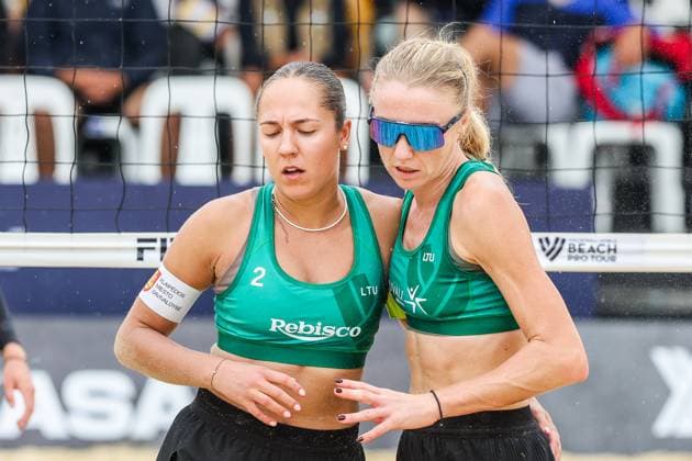 (251019) -- LAGUNA PROVINCE, Oct. 19, 2025 -- Ieva Dumbauskaite (R) Gerda Grudzinskaite of Lithuania celebrate after scoring a point during the women s semifinal match between Ieva Dumbauskaite Gerda Grudzinskaite of Lithuania and Jasmine Fleming Stefanie Fejes of Australia at the Volleyball World Beach Pro Tour in Laguna Province, the Philippines, on Oct. 19, 2025. ) (SP)THE PHILIPPINES-LAGUNA PROVINCE-VOLLEYBALL WORLD BEACH PRO TOUR ROUELLExUMALI 