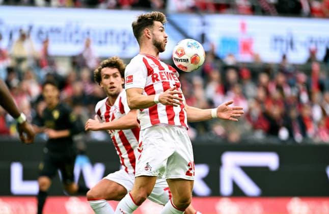 Fussball, Bundesliga, Deutschland, Herren, Saison 2025 2026, 7. Spieltag, Rhein Energie Stadion Köln, 1. FC Köln - FC Augsburg 1:1; Jan Thielmann (KOE). Aktion, Einzelbild.