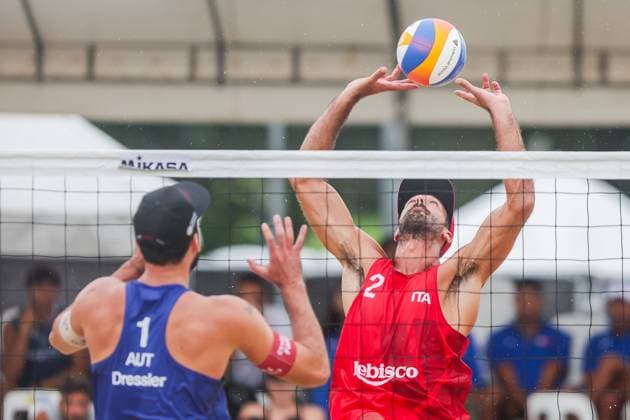 (251019) -- LAGUNA PROVINCE, Oct. 19, 2025 -- Alex Ranghieri (R) of Italy competes against Christoph Dressler of Austria during the men s bronze medal match between Manuel Alfieri Alex Ranghieri of Italy and Christoph Dressler Philipp Waller of Austria at the Volleyball World Beach Pro Tour in Laguna Province, the Philippines, Oct. 19, 2025. ) (SP)PHILIPPINES-LAGUNA PROVINCE-VOLLEYBALL-WORLD BEACH PRO TOUR ROUELLExUMALI 