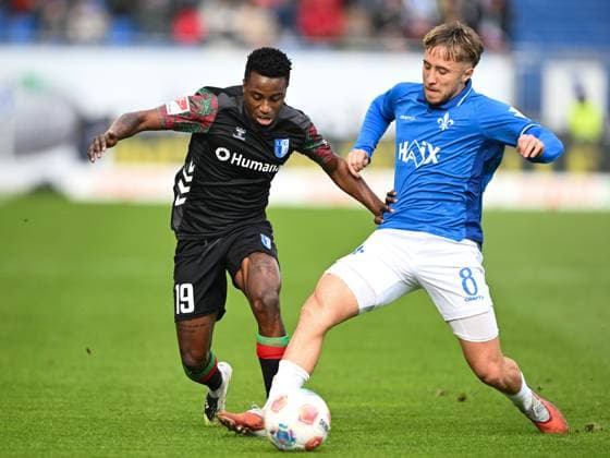 Lubambo Musonda (1.FC Magdeburg, 19) im Zweikampf mit Luca Marseiler (SV Darmstadt 1898, 08), GER, SV Darmstadt 98 vs 1. FC Magdeburg Fussball, 2. Bundesliga, 9. Spieltag, Spielzeit 2025 2026, 19.10.2025. DFL REGULATIONS PROHIBIT ANY USE OF PHOTOGRAPHS AS IMAGE SEQUENCES AND OR QUASI-VIDEO GER, SV Darmstadt 98 vs 1. FC Magdeburg Fussball, 2. Bundesliga, 9. Spieltag, Spielzeit 2025 2026, 19.10.2025. Darmstadt