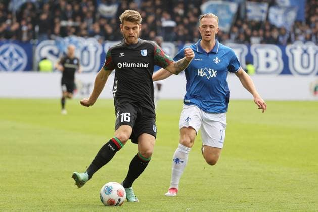 19.10.2025, xtvx, Fussball 2.Bundesliga, SV Darmstadt 98 - 1.FC Magdeburg v.l. Zweikampf, Duell, duel, tackle, compete Marcus Mathisen (1. FC Magdeburg) Isac Lidberg (SV Darmstadt 98) (DFL DFB REGULATIONS PROHIBIT ANY USE OF PHOTOGRAPHS as IMAGE SEQUENCES and or QUASI-VIDEO) Darmstadt