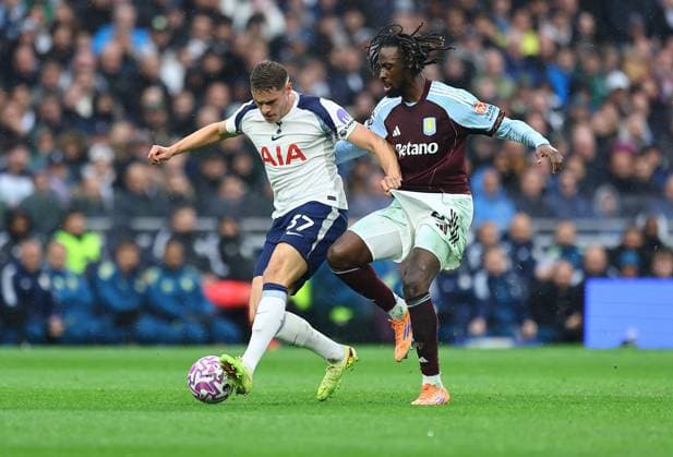 Micky van de Ven of Tottenham Hotspur wins the ball from Evann Guessand of Aston Villa Tottenham Hotspur v Aston Villa, Premier League, Football, Tottenham Hotspur Stadium, London, UK - 19 Oct 2025London Tottenham Hotspur Stadium United Kingdom EDITORIAL USE ONLY No use with unauthorised audio, video, data, fixture lists, club league logos or live services. Online in-match use limited to 120 images, no video emulation. No use in betting, games or single club league player publications. Copyright: xMichaelxZemanek Shutterstockx 15545865m