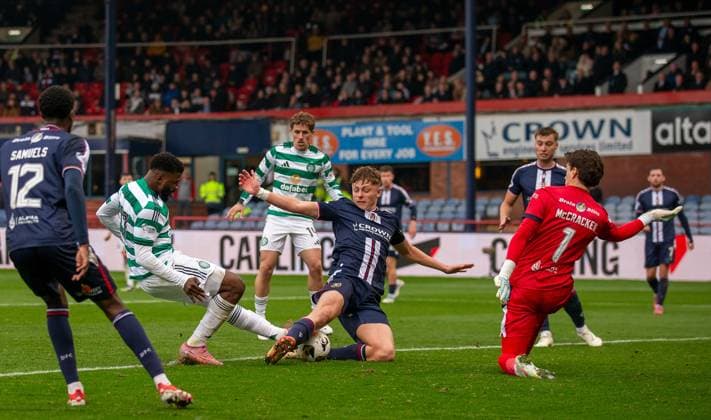 19th October 2025; Dens Park, Dundee, Scotland; Scottish Premiership Football, Dundee versus Celtic; Luke Graham of Dundee blocks a shot from Kelechi Iheanacho of Celtic  VagelisxGeorgariou