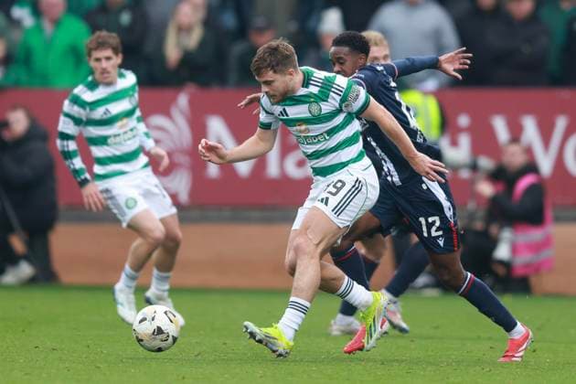 19th October 2025; Dens Park, Dundee, Scotland; Scottish Premiership Football, Dundee versus Celtic; James Forrest of Celtic takes on Imari Samuels of Dundee  DavidxYoung