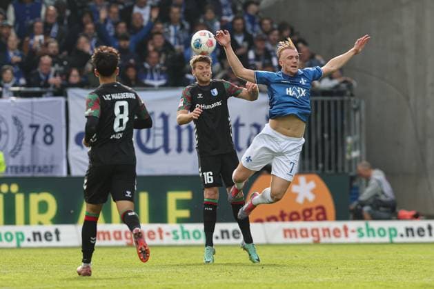 Isac Lidberg (SV Darmstadt 98,7) gegen Marcus Mathisen (1. FC Magdeburg,16) - 2. Fußball Bundesliga Saison 2025-2026 SV Darmstadt 98 vs 1. FC Magdeburg im Merck Stadion am Böllenfalltor in Darmstadt - Aktion,Fußball,Mann,Männer,Deutschland,19.10.2025